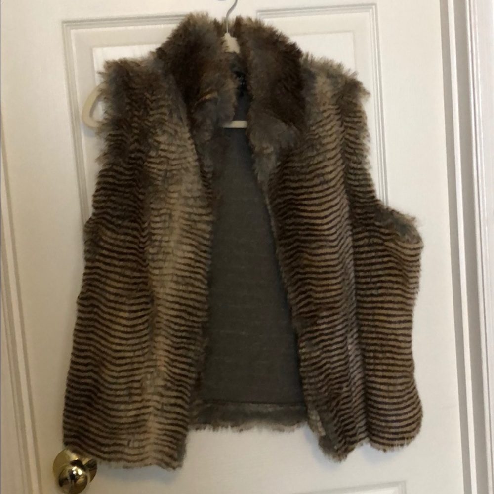 Sleeveless faux fur vest with front hook closure